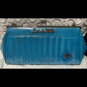 Lux de Ville teal shoulder purse with sparkles.